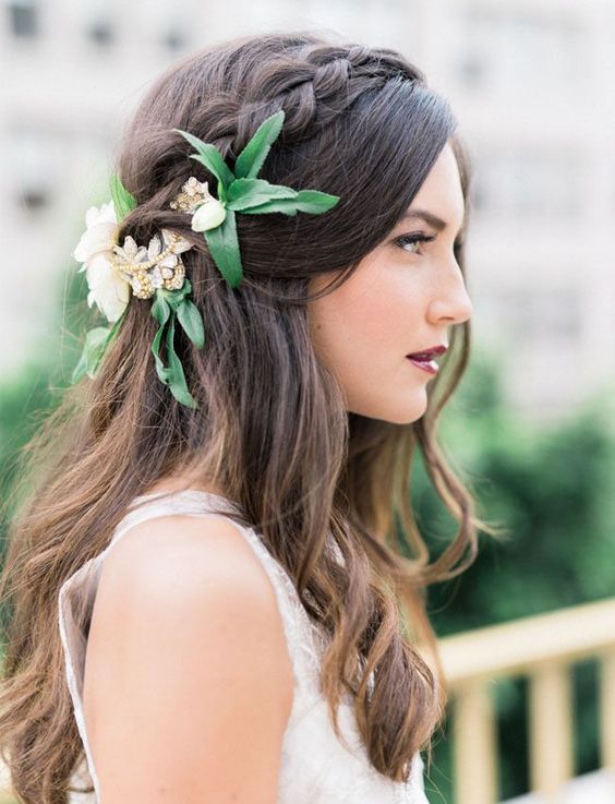 weaving hairstyles with flowers will look more perfect and more individual