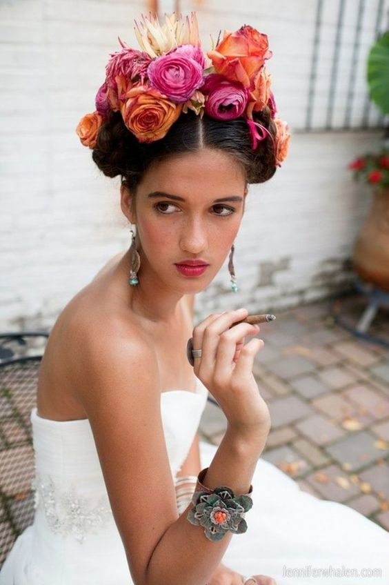 weaving hairstyles with flowers will look more perfect and more individual