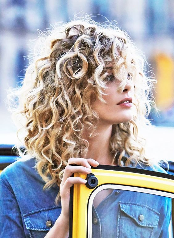 Stylish curly hair makes you look more beautiful and charming
