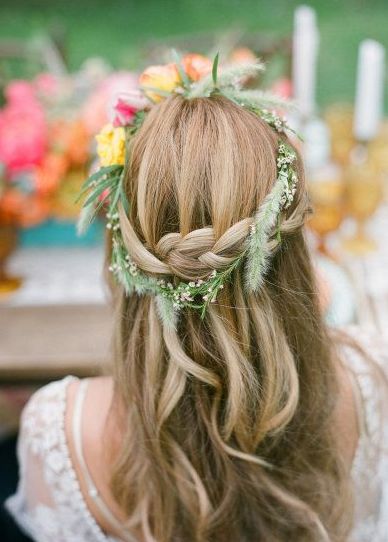 weaving hairstyles with flowers will look more perfect and more individual