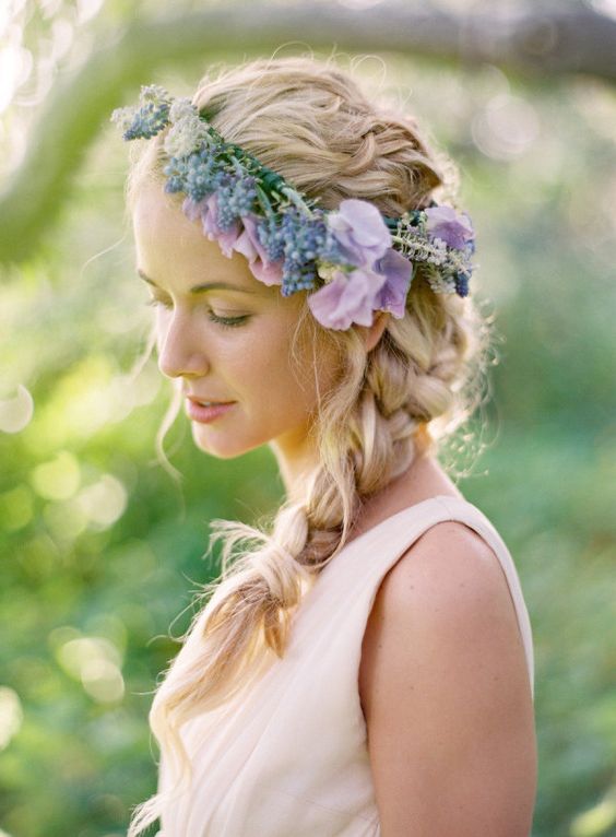 weaving hairstyles with flowers will look more perfect and more individual