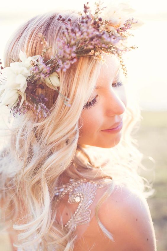 weaving hairstyles with flowers will look more perfect and more individual