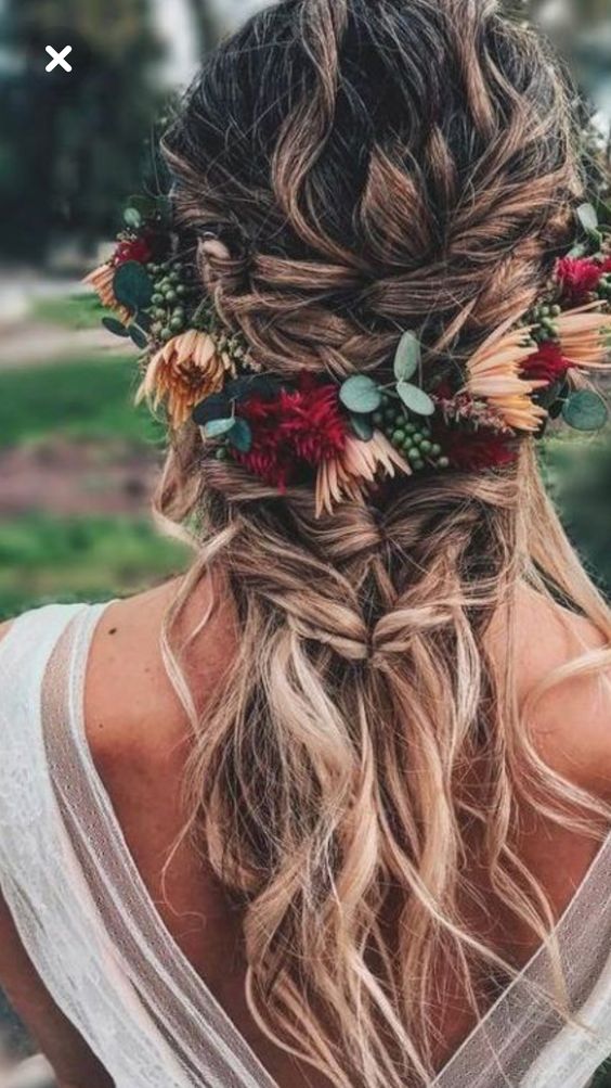 weaving hairstyles with flowers will look more perfect and more individual