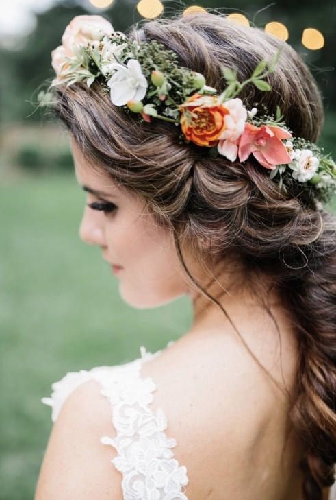 weaving hairstyles with flowers will look more perfect and more individual