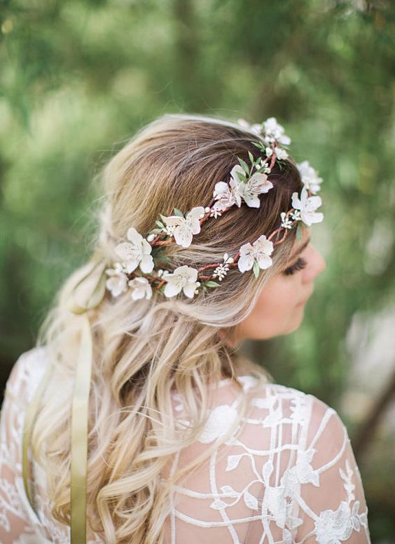 weaving hairstyles with flowers will look more perfect and more individual