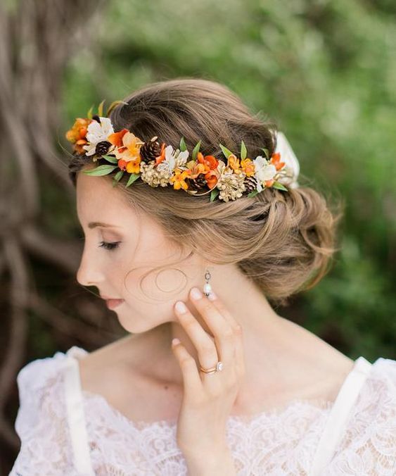 weaving hairstyles with flowers will look more perfect and more individual