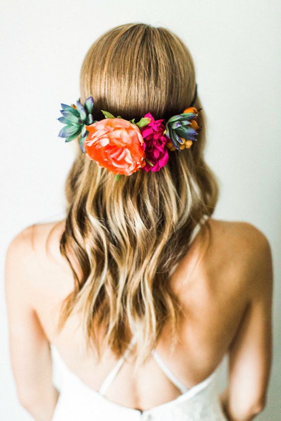 weaving hairstyles with flowers will look more perfect and more individual