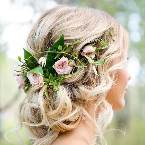 weaving hairstyles with flowers will look more perfect and more individual