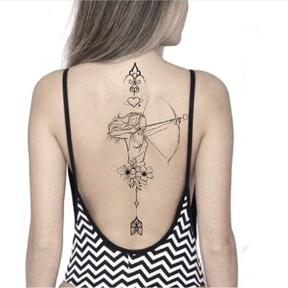 Back tattoos of a woman; Ribbon tattoos; Flower tattoos; Cross tattoos; Little prince tattoos; Symbol tattoo; Pattern tattoos; Back tattoos