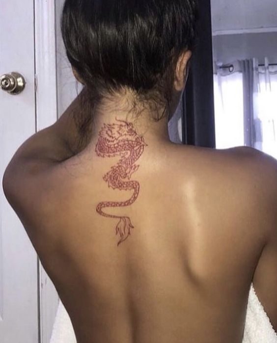 Back tattoos of a woman; Ribbon tattoos; Flower tattoos; Cross tattoos; Little prince tattoos; Symbol tattoo; Pattern tattoos; Back tattoos