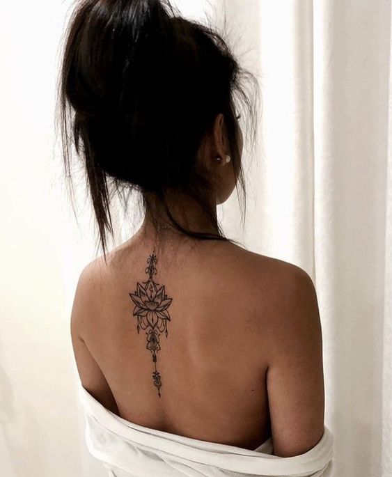 Back tattoos of a woman; Ribbon tattoos; Flower tattoos; Cross tattoos; Little prince tattoos; Symbol tattoo; Pattern tattoos; Back tattoos