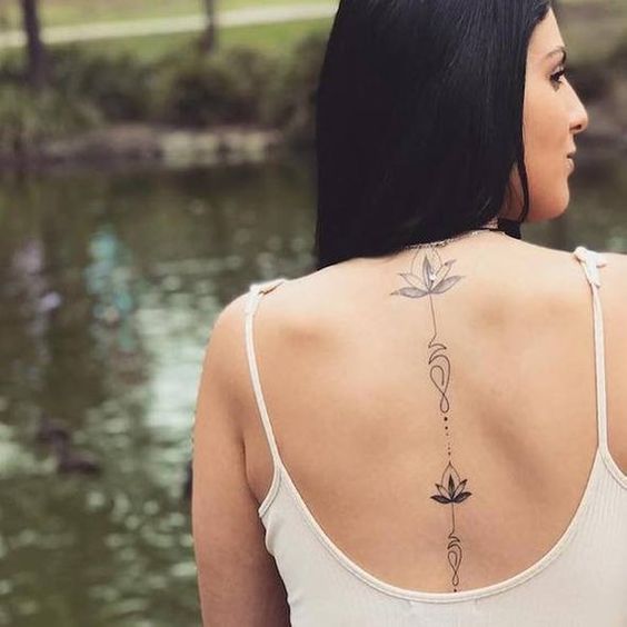 Back tattoos of a woman; Ribbon tattoos; Flower tattoos; Cross tattoos; Little prince tattoos; Symbol tattoo; Pattern tattoos; Back tattoos