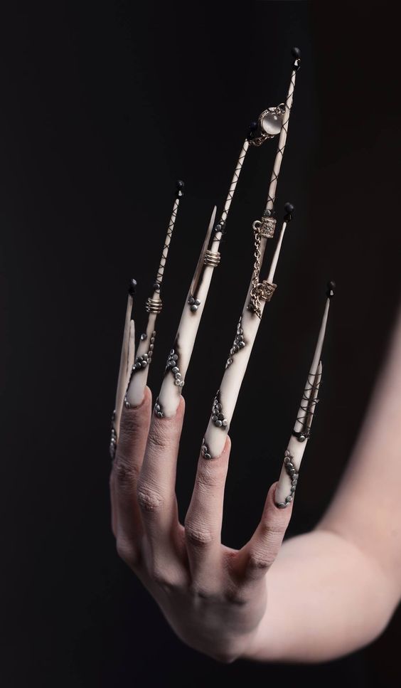 Long pointed nails; Extra long nails; Nail art; Long nail art; Sharp nails