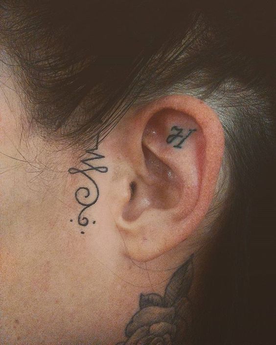 Ear tattoo;Tiny tattoo; tattoo designs; delicate tattoo