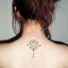 Back tattoos of a woman; Ribbon tattoos; Flower tattoos; Cross tattoos; Little prince tattoos; Symbol tattoo; Pattern tattoos; Back tattoos